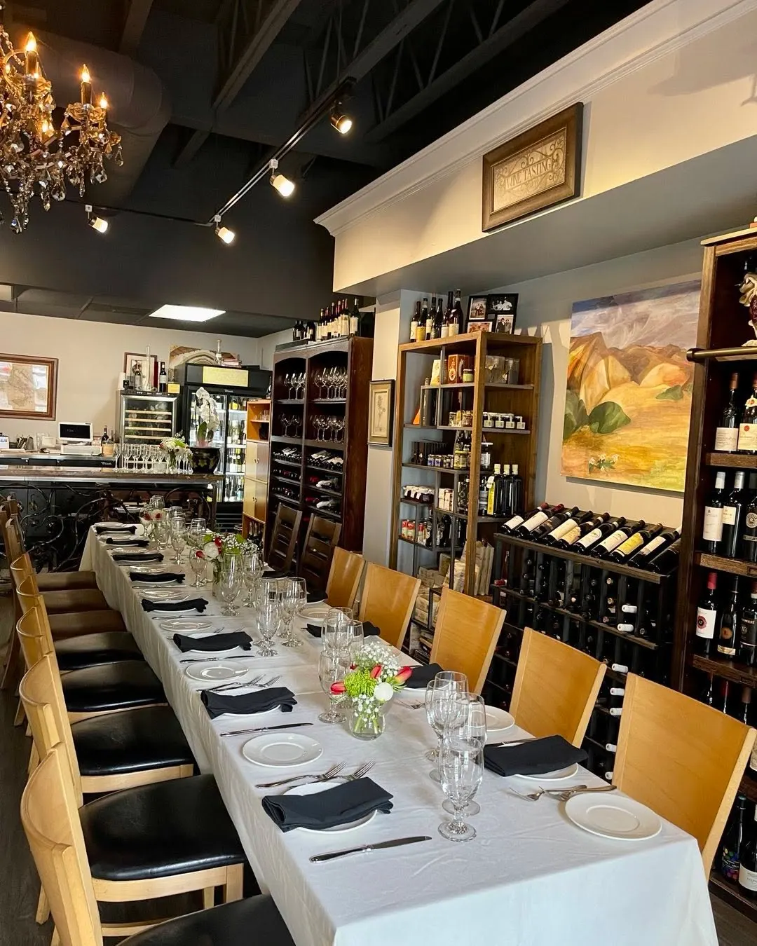 Private dining table with white linens and glassware