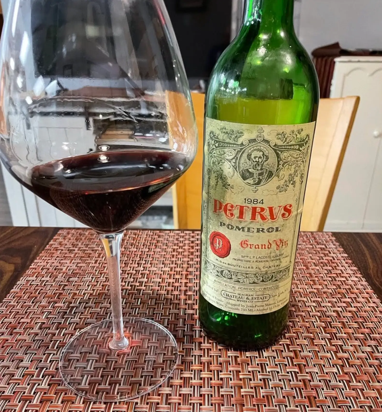 Petrus 1984 Pomerol with wine glass